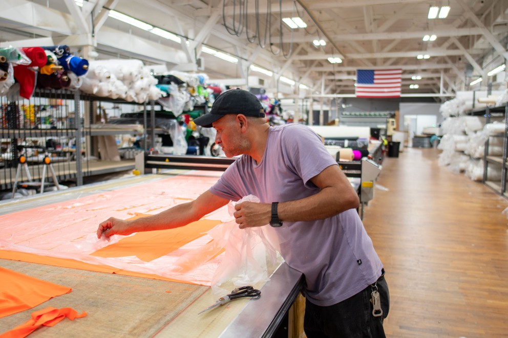 Man working with fabric